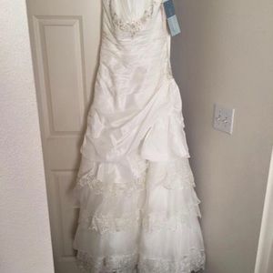 Wedding dress never used size 4
